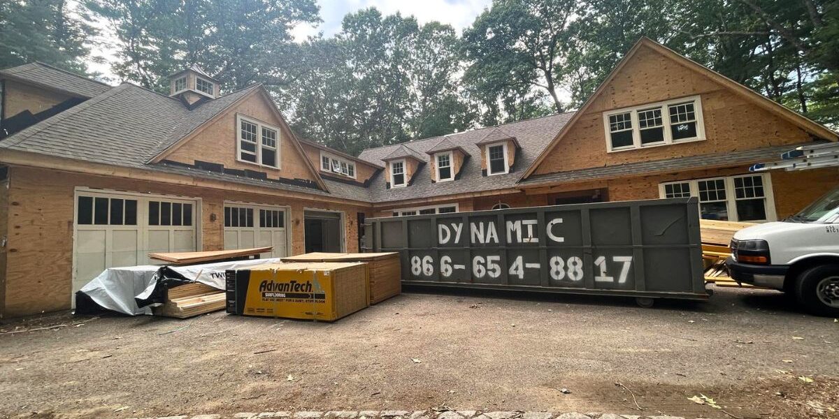 Large estate home framing phase with AdvanTech subflooring and jobsite management in Marlborough MA