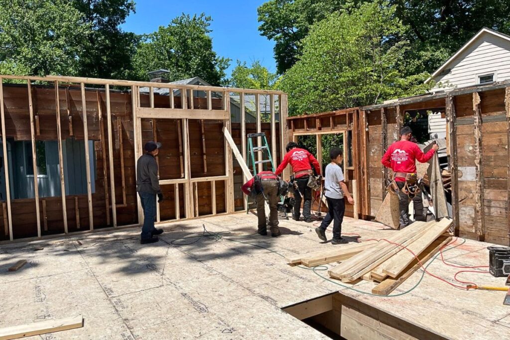 General contractor crew executing full house renovation and structural carpentry in Massachusetts