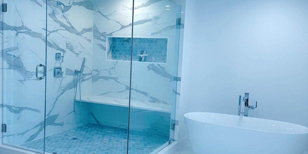 Luxury custom spa bathroom suite with walk-in glass shower and freestanding soaking tub in Wellesley MA